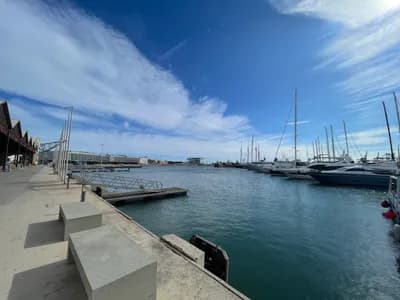 Marina with boats and a clear sky